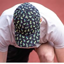 man wearing a black hat with turtles